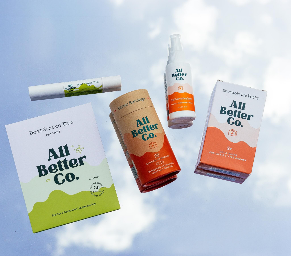 Collection of 'All Better Co.' products against a blue sky background