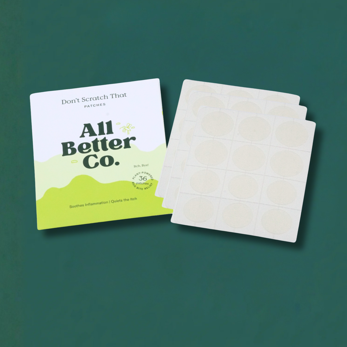 Patches and packaging of All Better Co. on a teal background