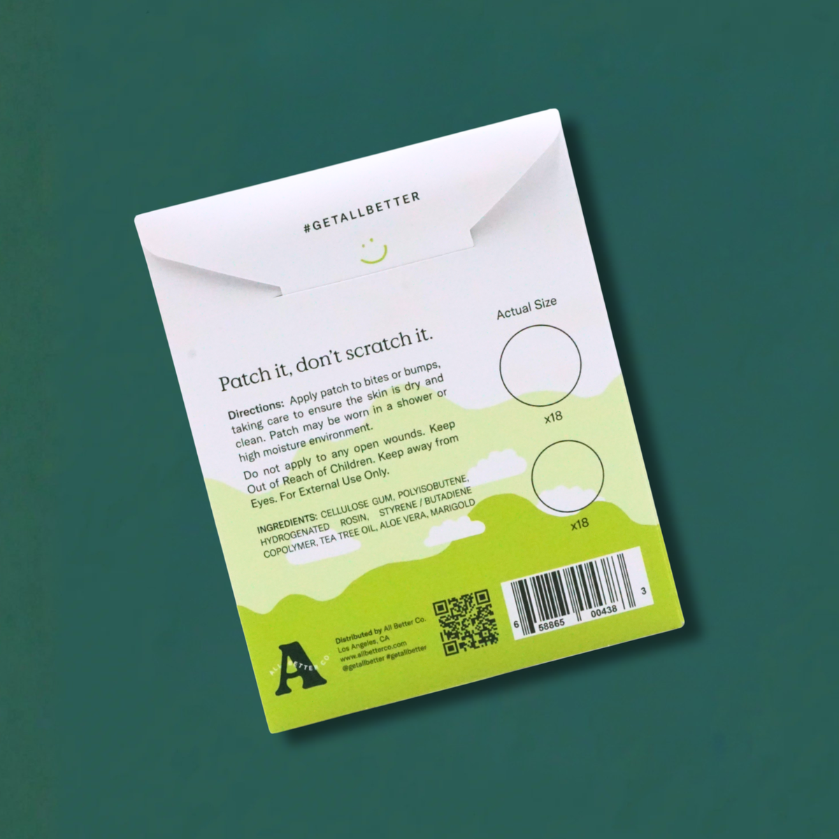 Back of a green and white product package with text and a QR code on a teal background