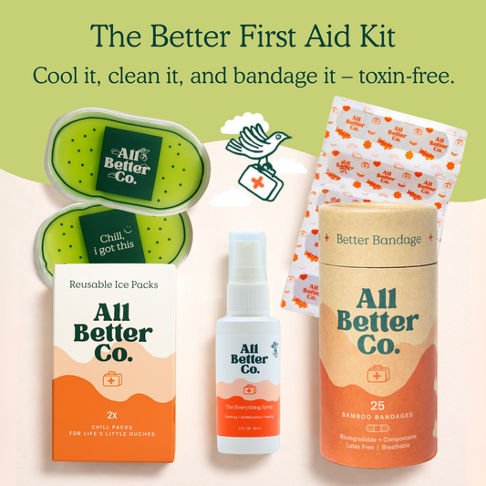 All Better Co. First Aid Kit set including reusable ice packs, a spray bottle, and bamboo bandages, displayed on a light cream background with a green header reading 'The Better First Aid Kit'.
