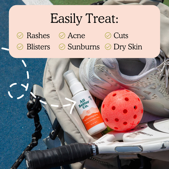 A skincare product bottle labeled 'All Beauty Co.' nestled in a beige backpack alongside athletic gear, including a white sneaker, a red perforated ball, and a black handlebar grip.